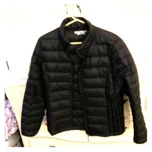 Lightweight black puffer jacket.